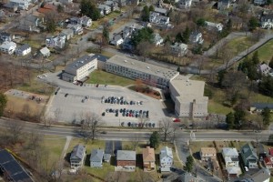 Newton Public Schools Buying Aquinas School